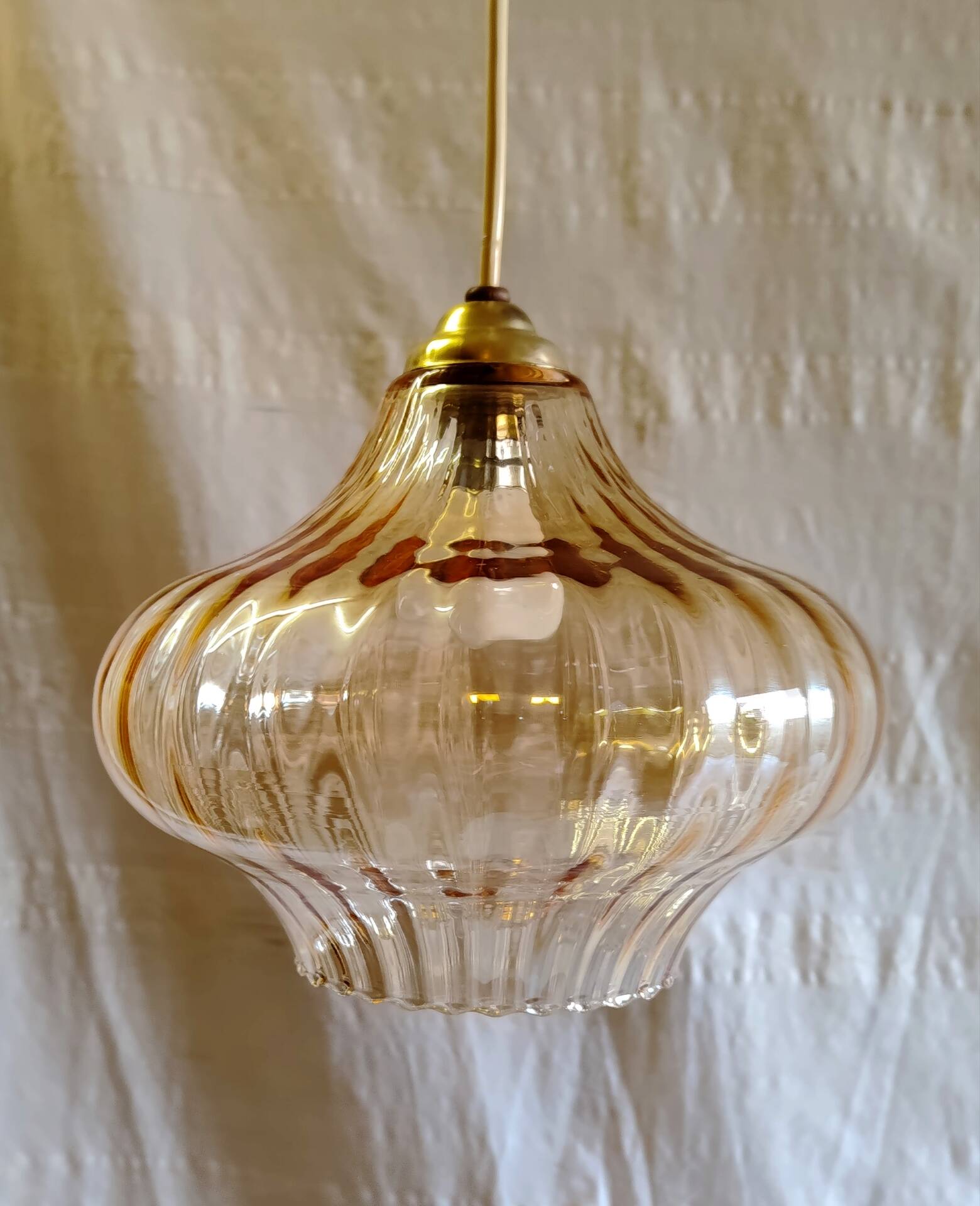 70's amber glass suspension design