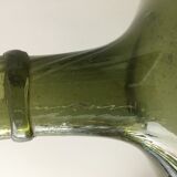 Old demijohn full of bubbles