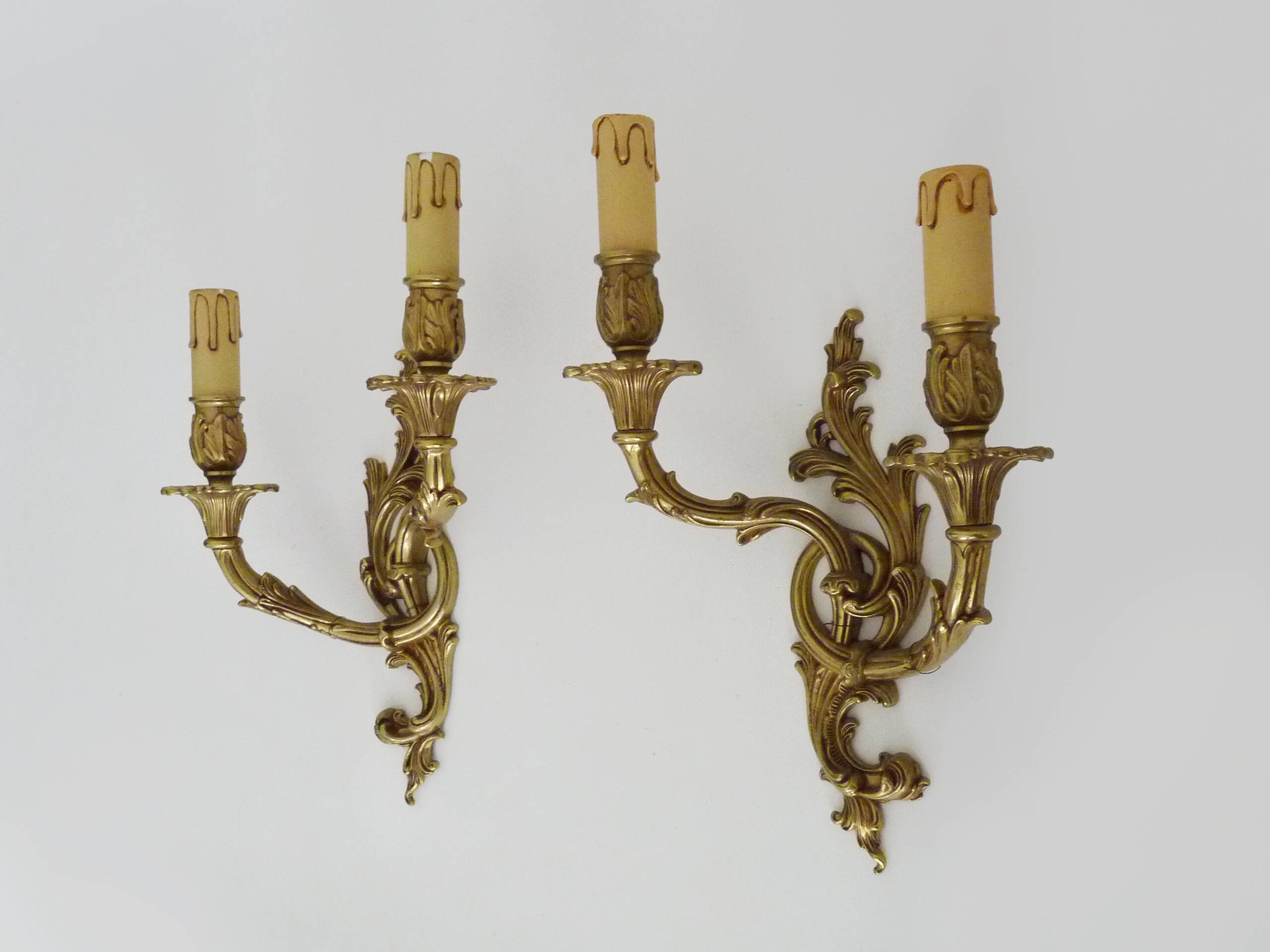Vintage pair of double wall sconces in bronze from the 1960s.