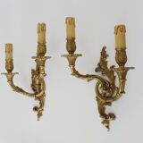 Vintage pair of double wall sconces in bronze from the 1960s.