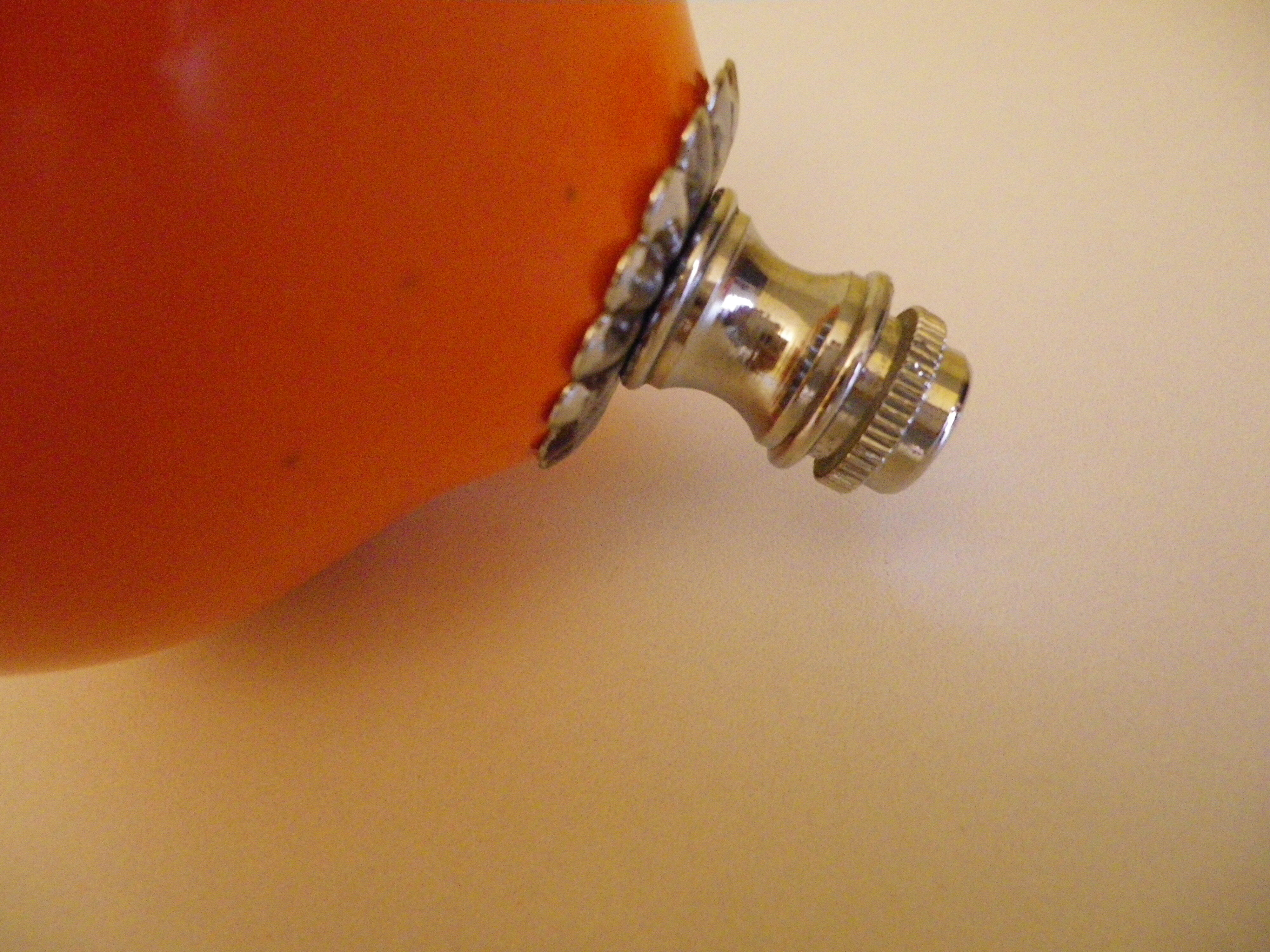 Vintage hanging from the 70s with chrome frame and enamelled orange ball finish