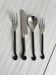 Set of 4 hammered metal cutlery with snail pattern.