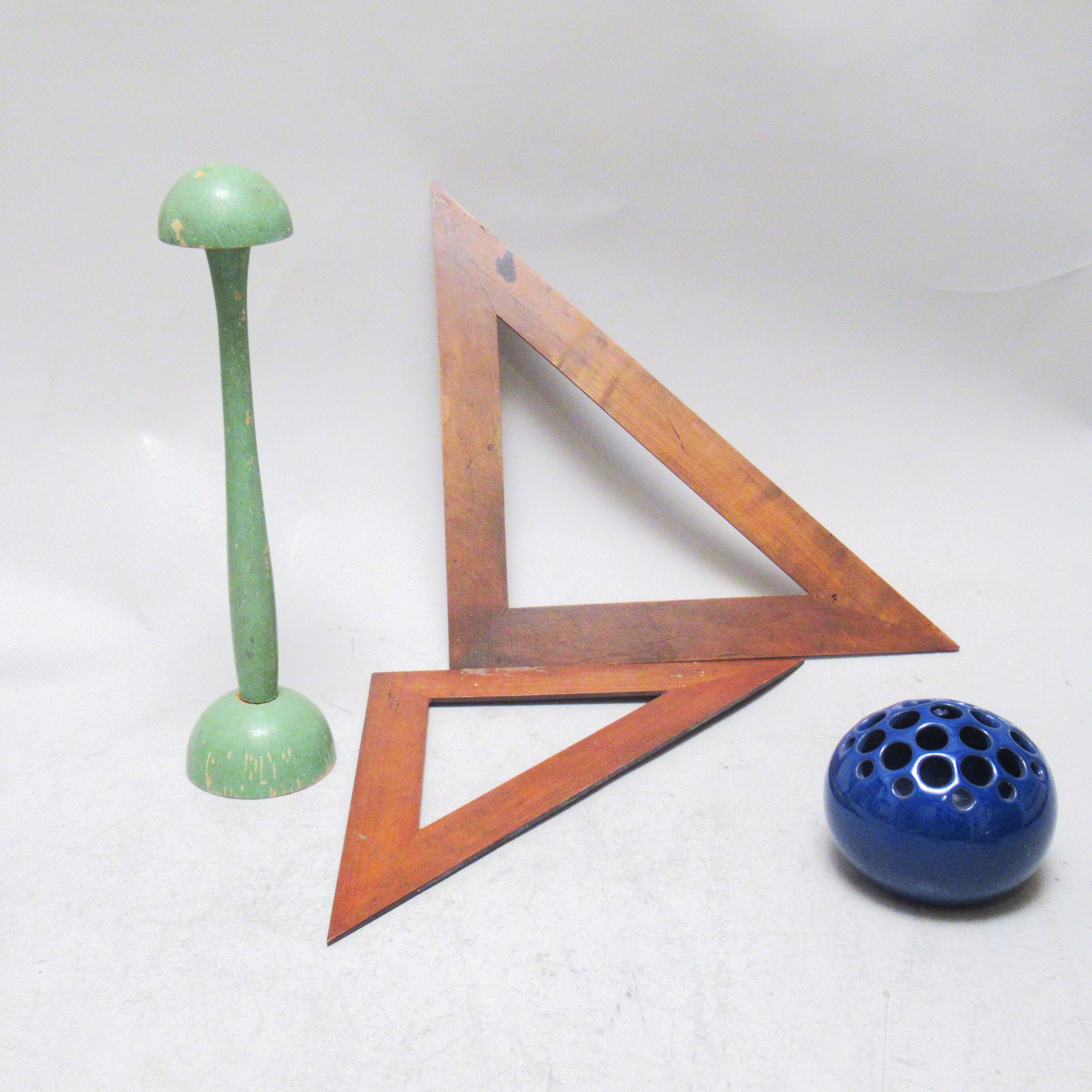 Two school brackets in natural wood