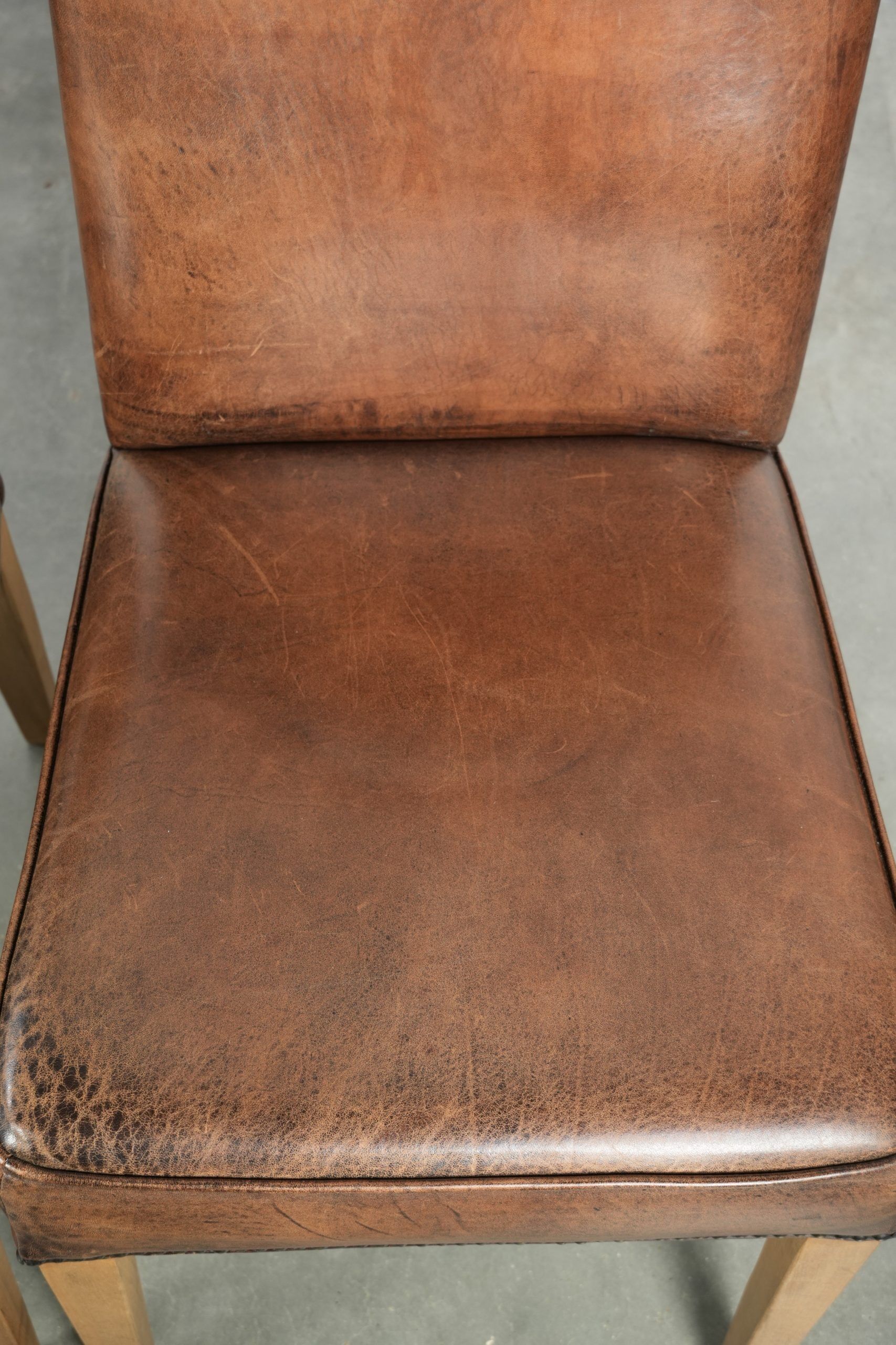 Vintage set of 4 dining chairs made of sheepskin leather with a high back