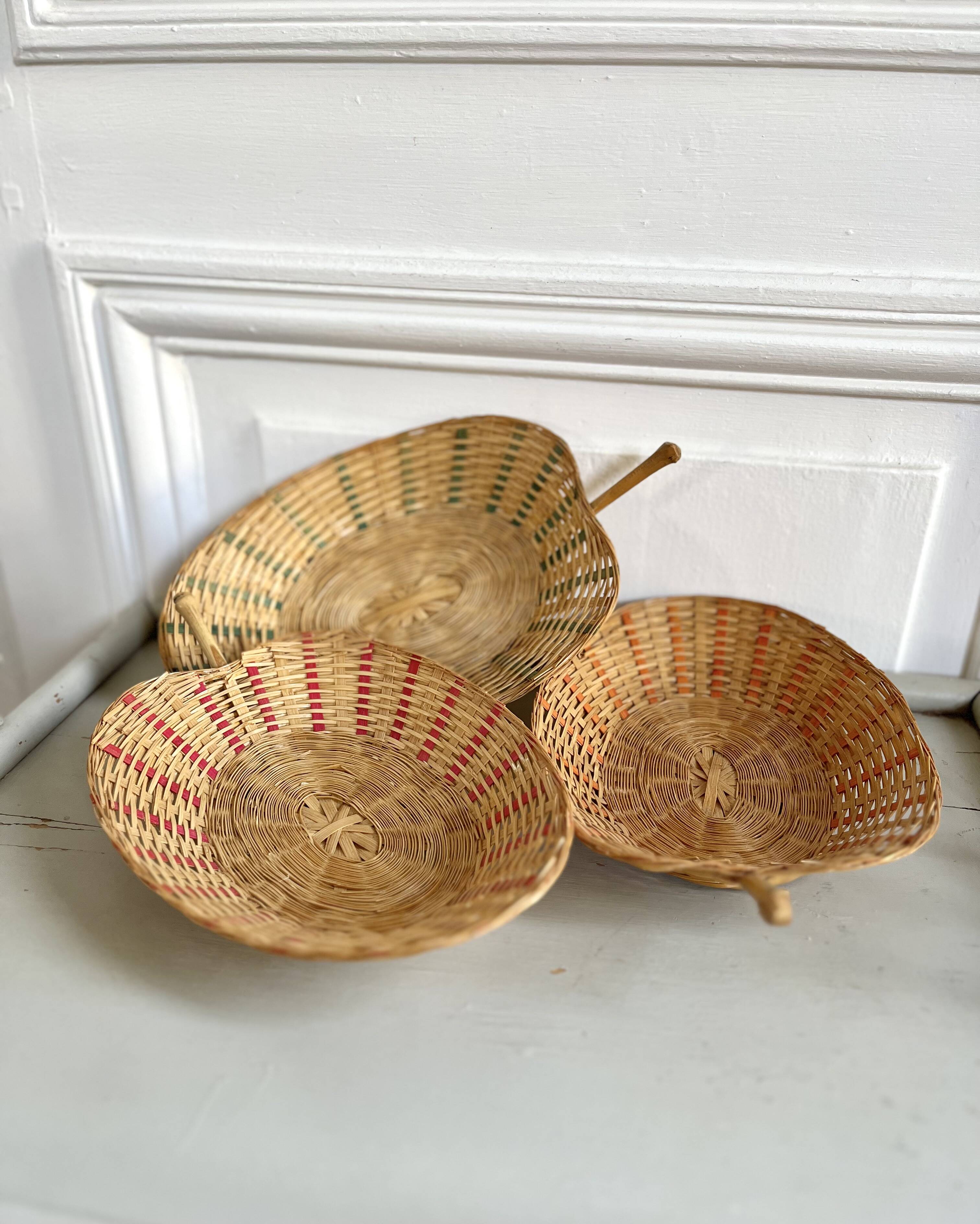 Trio of vintage wicker and bamboo baskets