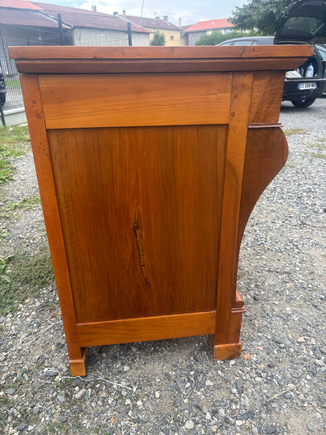 Restoration period walnut chest of drawers with a scroll handle