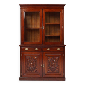 Vitrine ou bibliothèque Art Nouveau en chêne avec sculptures et porte vitrée