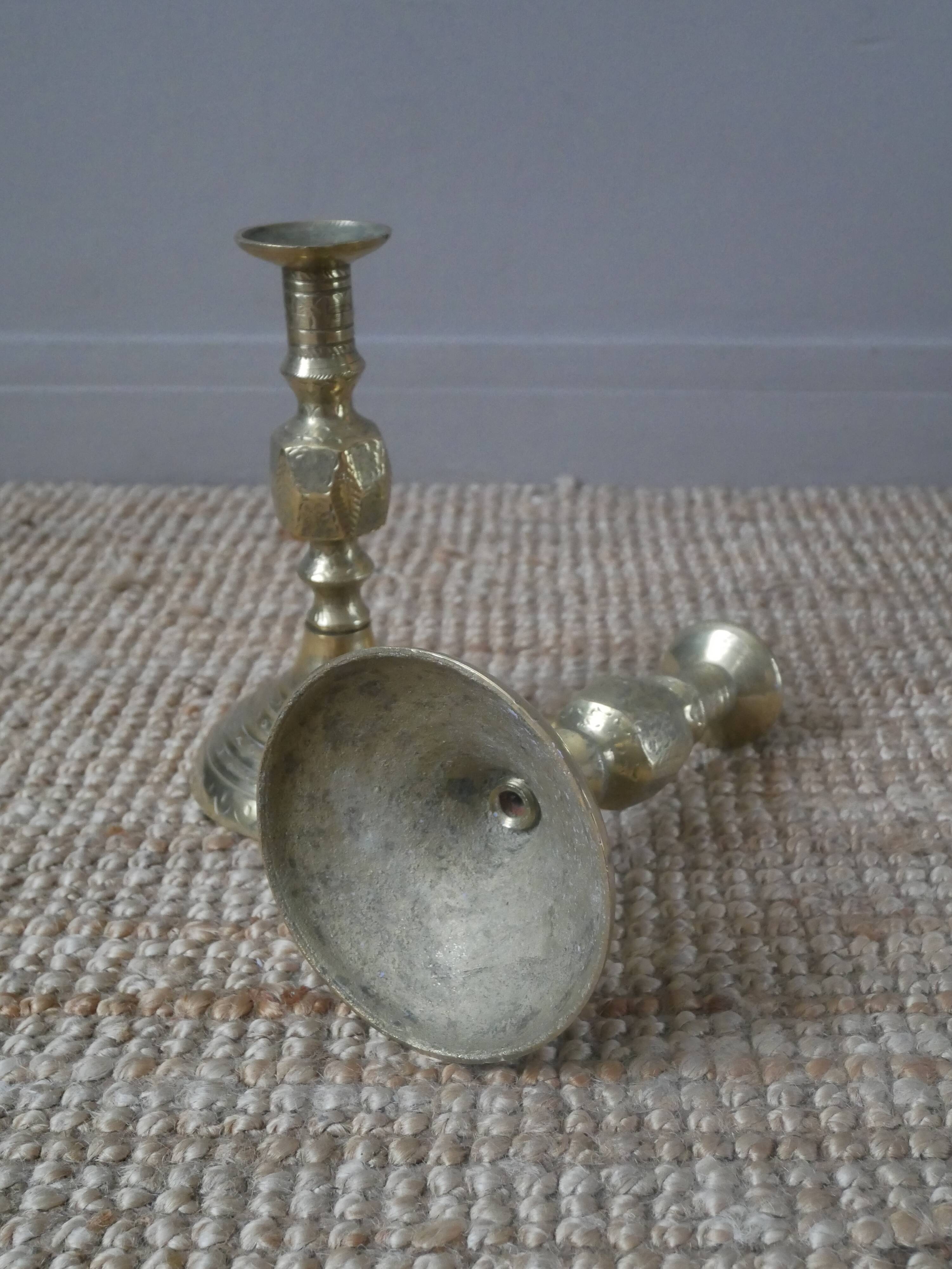 Pair of brass candlesticks in gold metal, ethnic tribal decoration, bohemian artisanal production