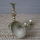 Pair of brass candlesticks in gold metal, ethnic tribal decoration, bohemian artisanal production