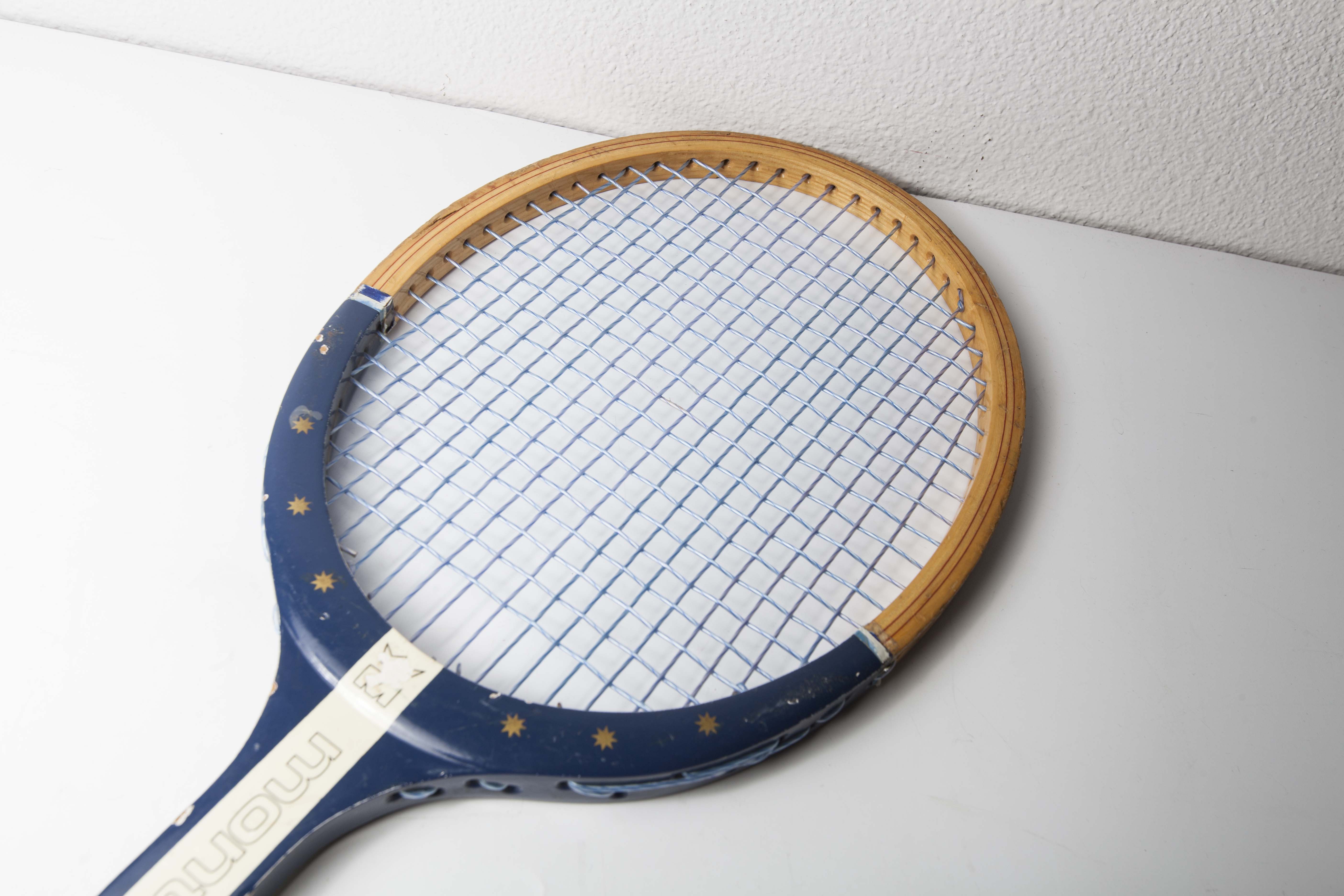Blue Montana M505 racket with leather bag