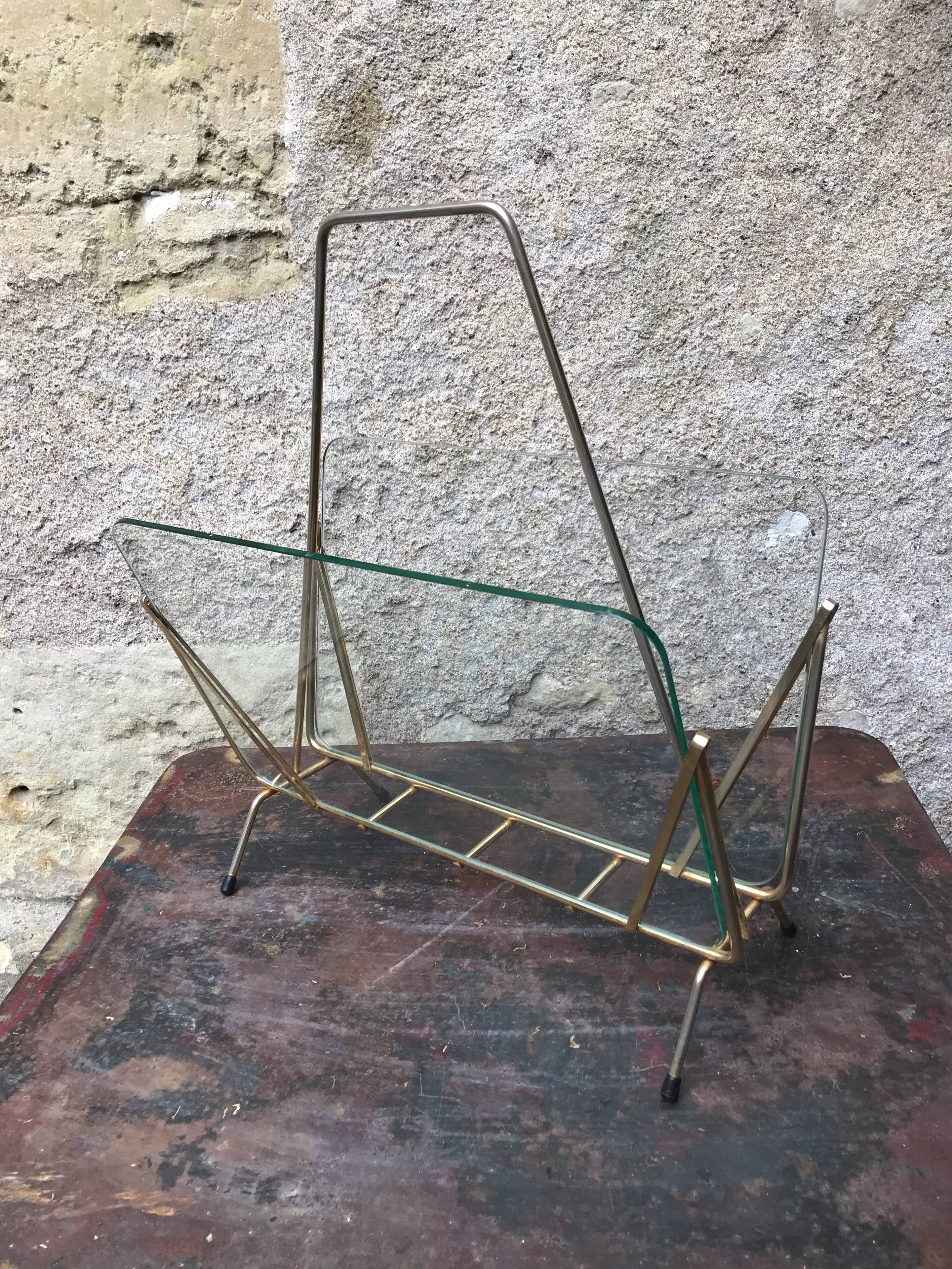 Glass and gold metal magazine door