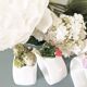 Lot de 4 ronds de serviette en barbotine.