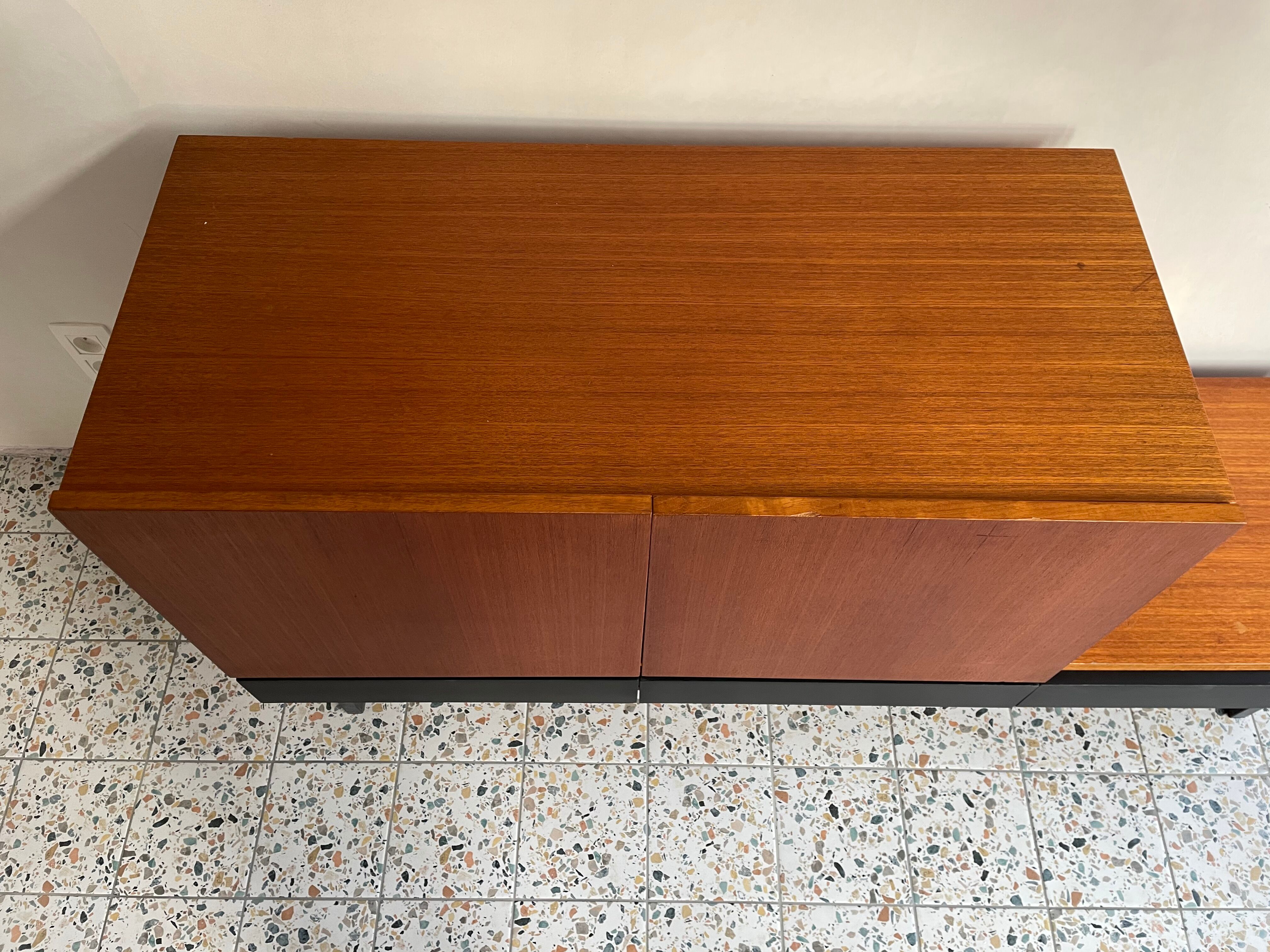 Asymmetrical vintage teak row