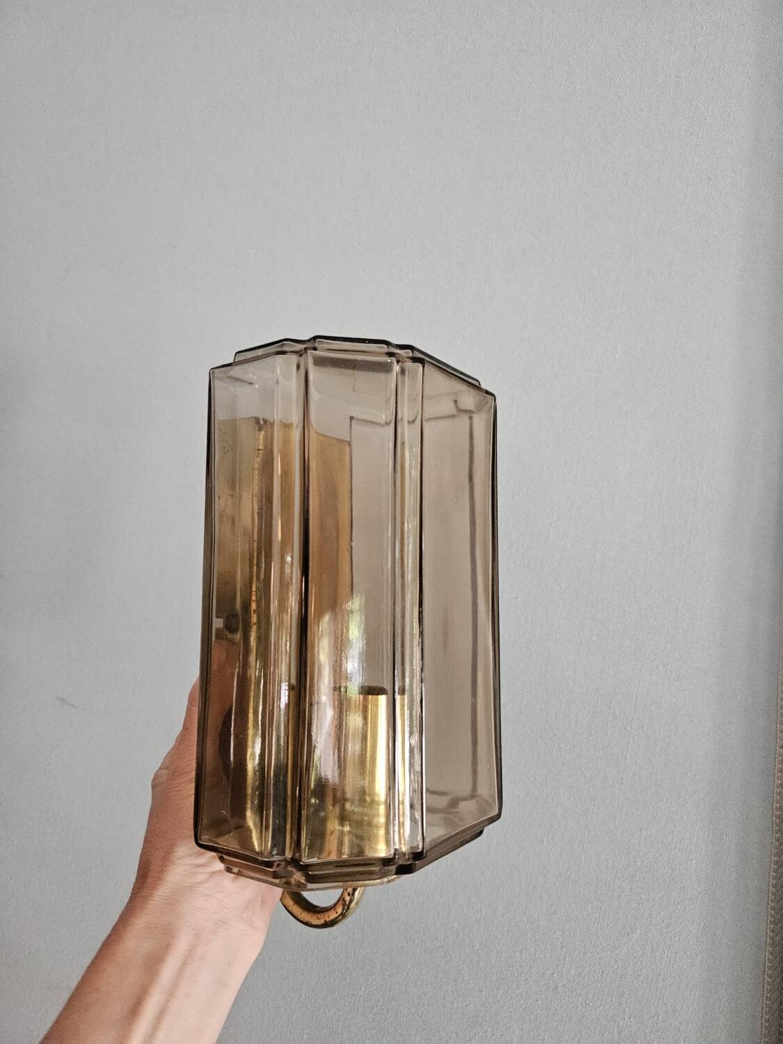 Pair of glass and brass wall lights, 1960s.