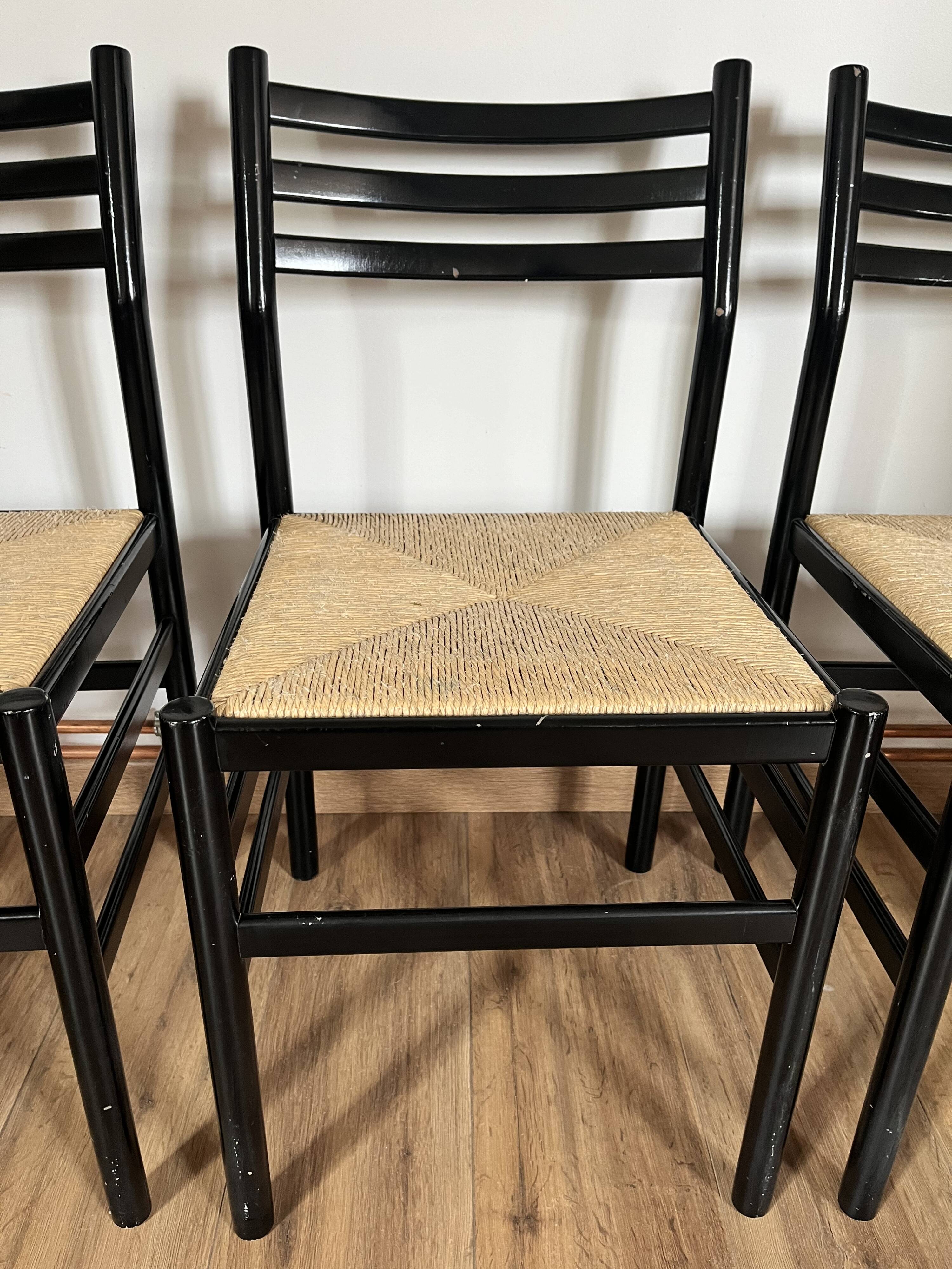 Set of 4 Italian black chairs 1970s