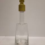 pair of decanters, bottles or jars, made in crystal with a ceramic tap enameled in green color