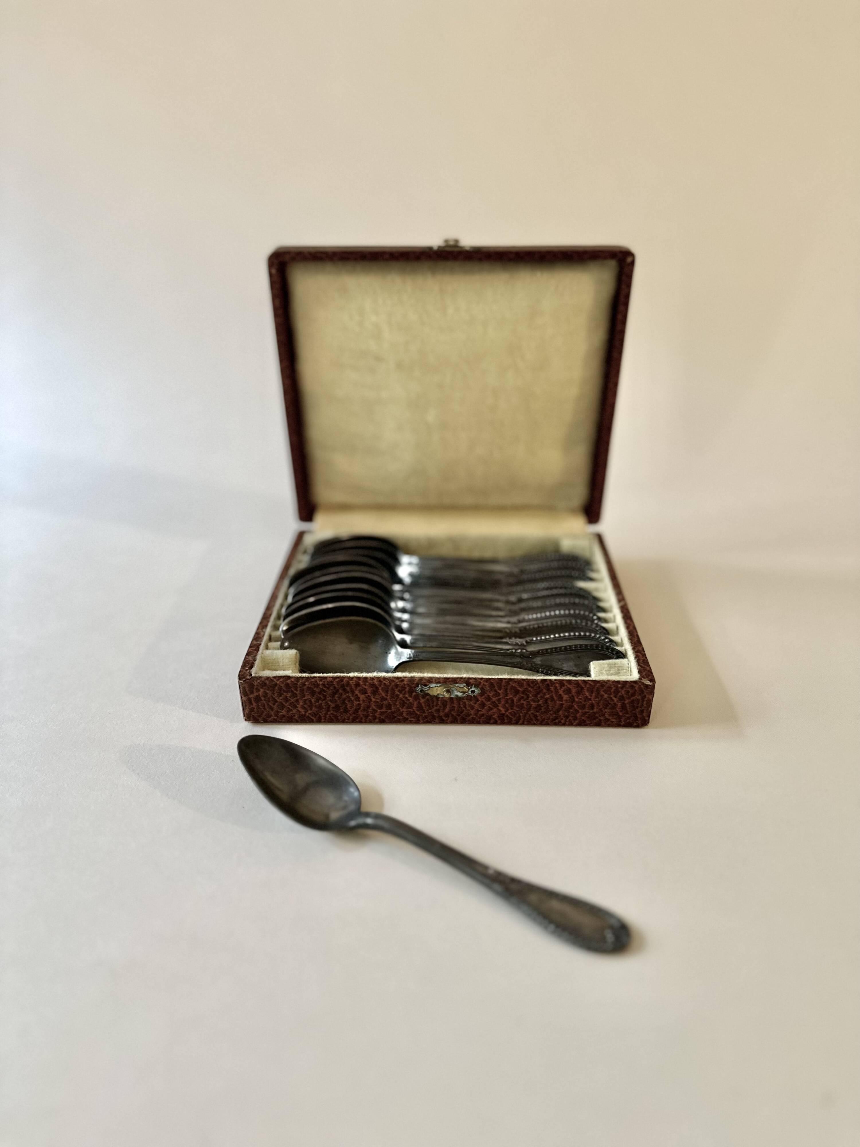 Service of 12 silver-plated dessert spoons