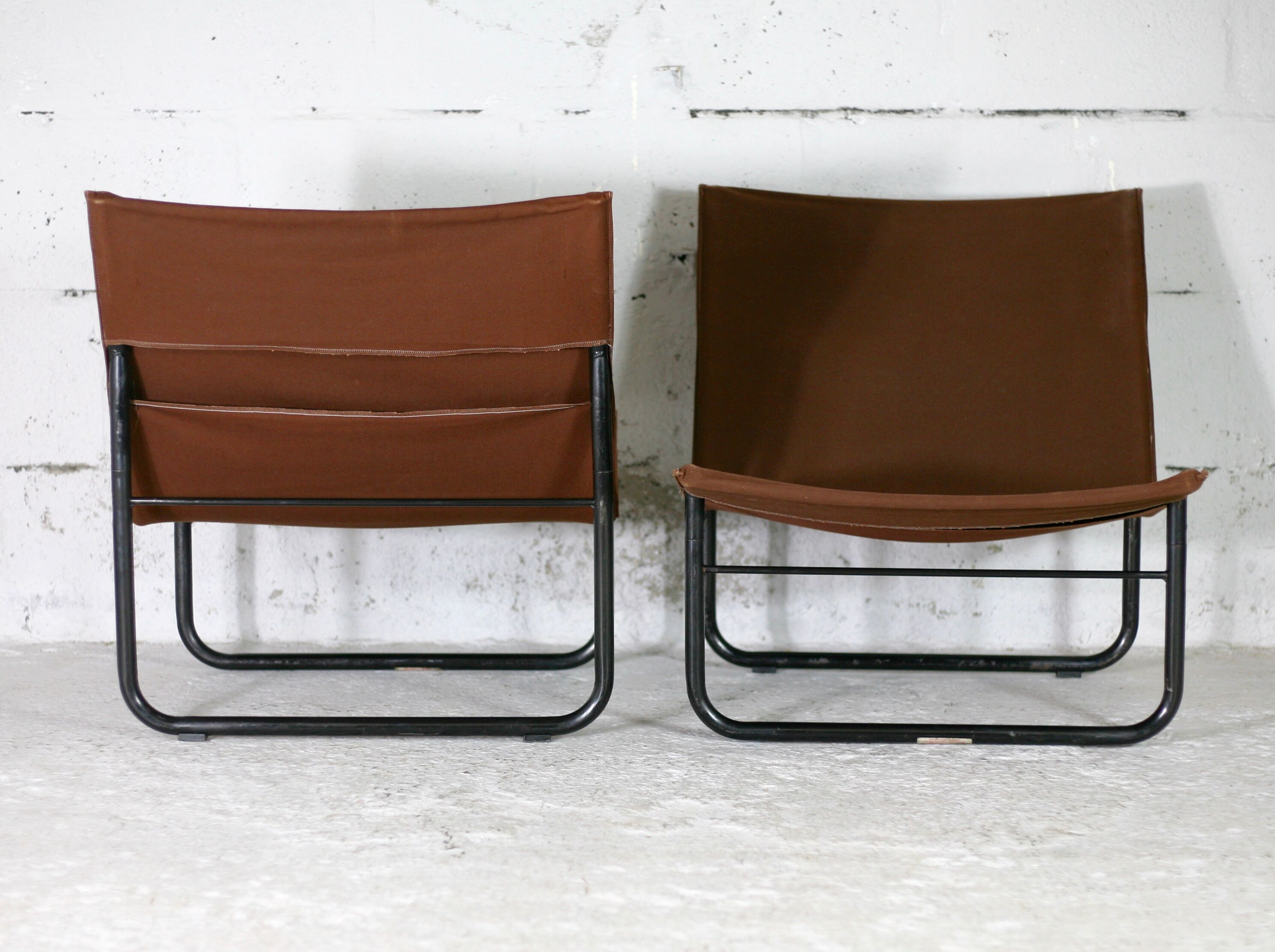 Pair of KEBE drivers, Denmark, circa 1975. Steel and "chocolate" canvas
