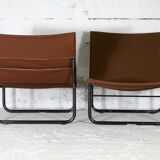 Pair of KEBE drivers, Denmark, circa 1975. Steel and "chocolate" canvas