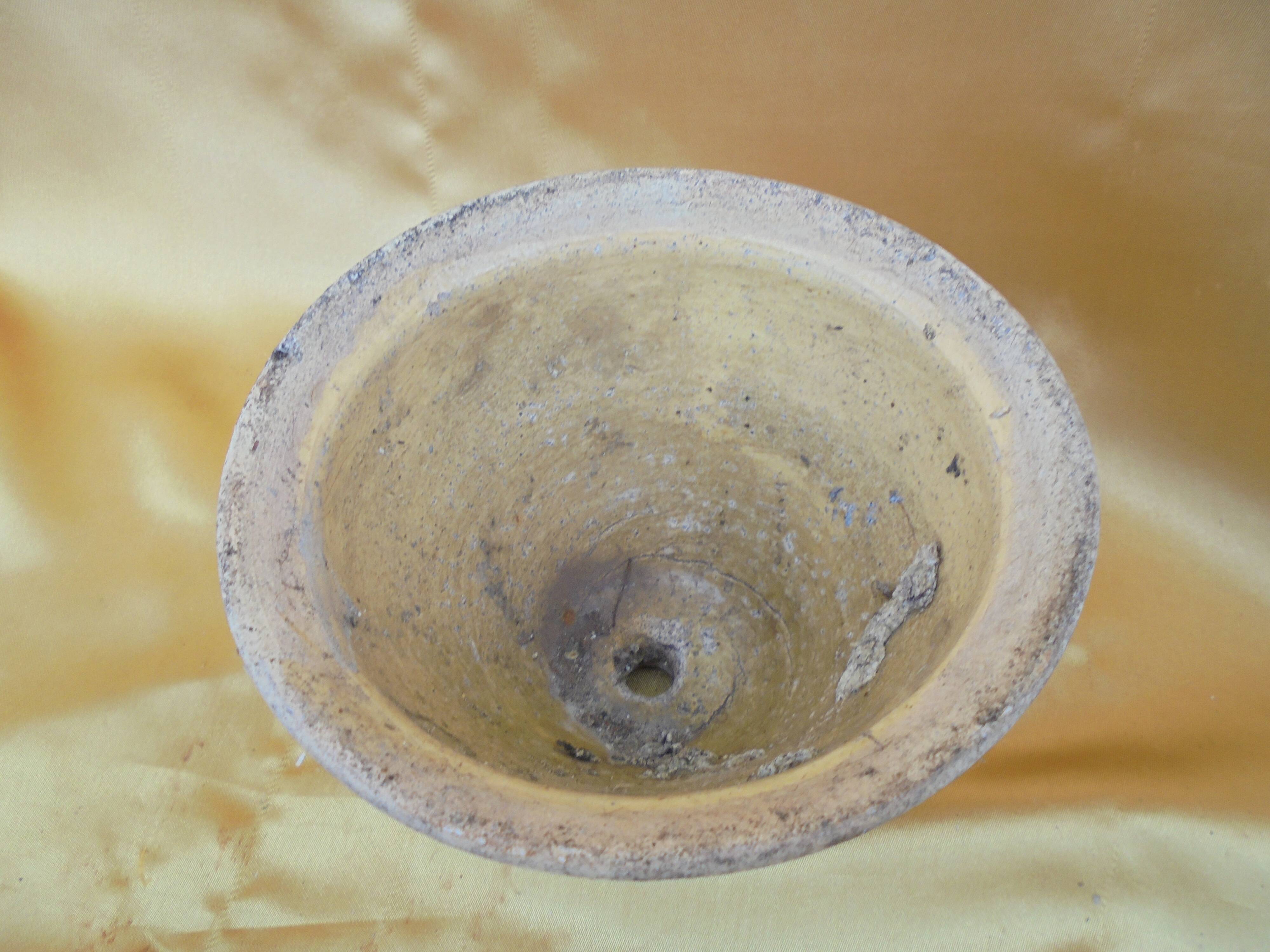 Old terracotta pot with glazed resin