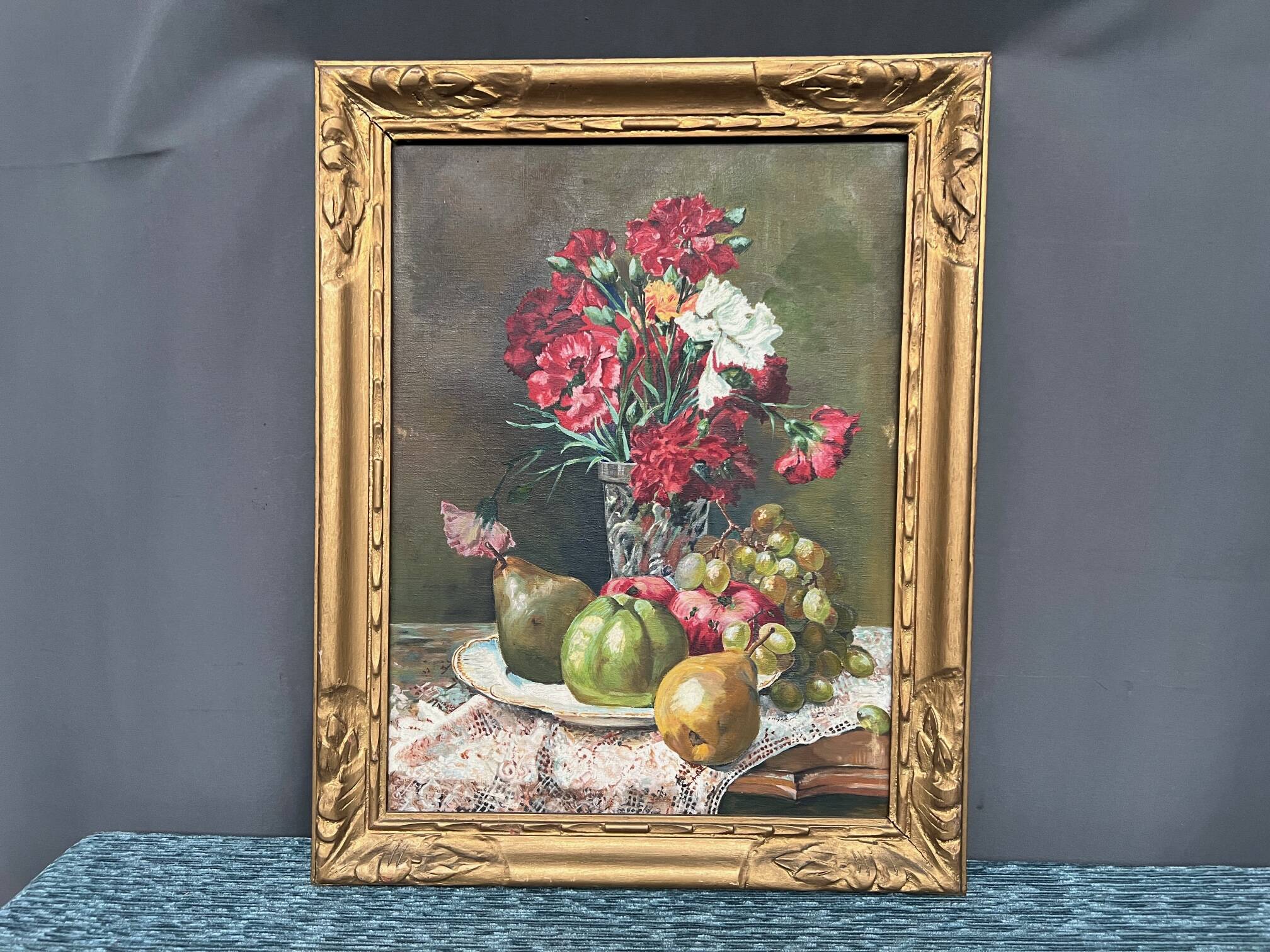 Old painting “Still life with flowers and fruit”.