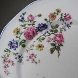 7 assiettes à dessert Bernardaud en porcelaine de Limoges décor floral, années 20-50