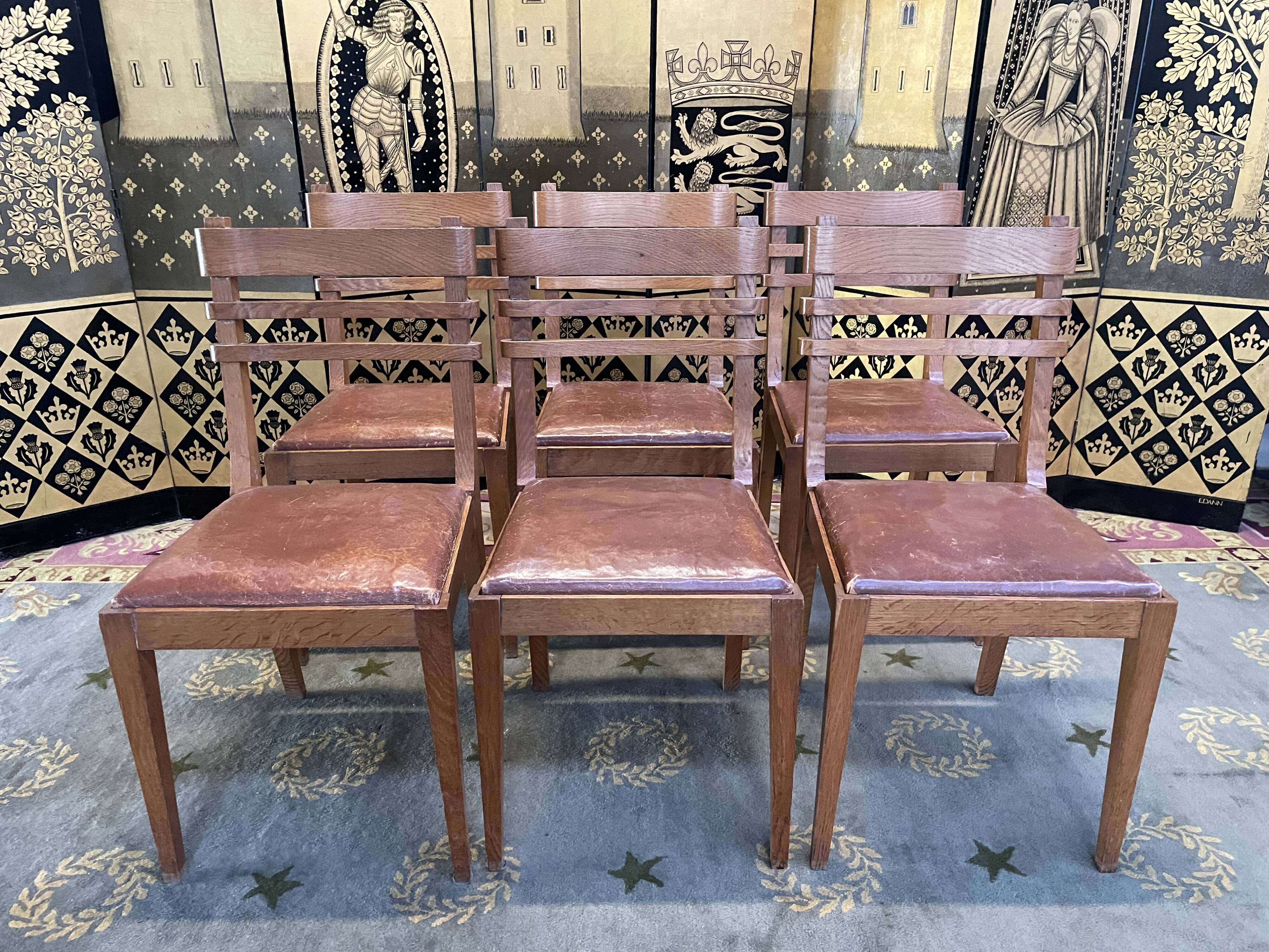 Suite of 6 oak and leather chairs 1950