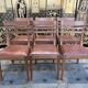 Suite de 6 chaises en chêne et cuir 1950
