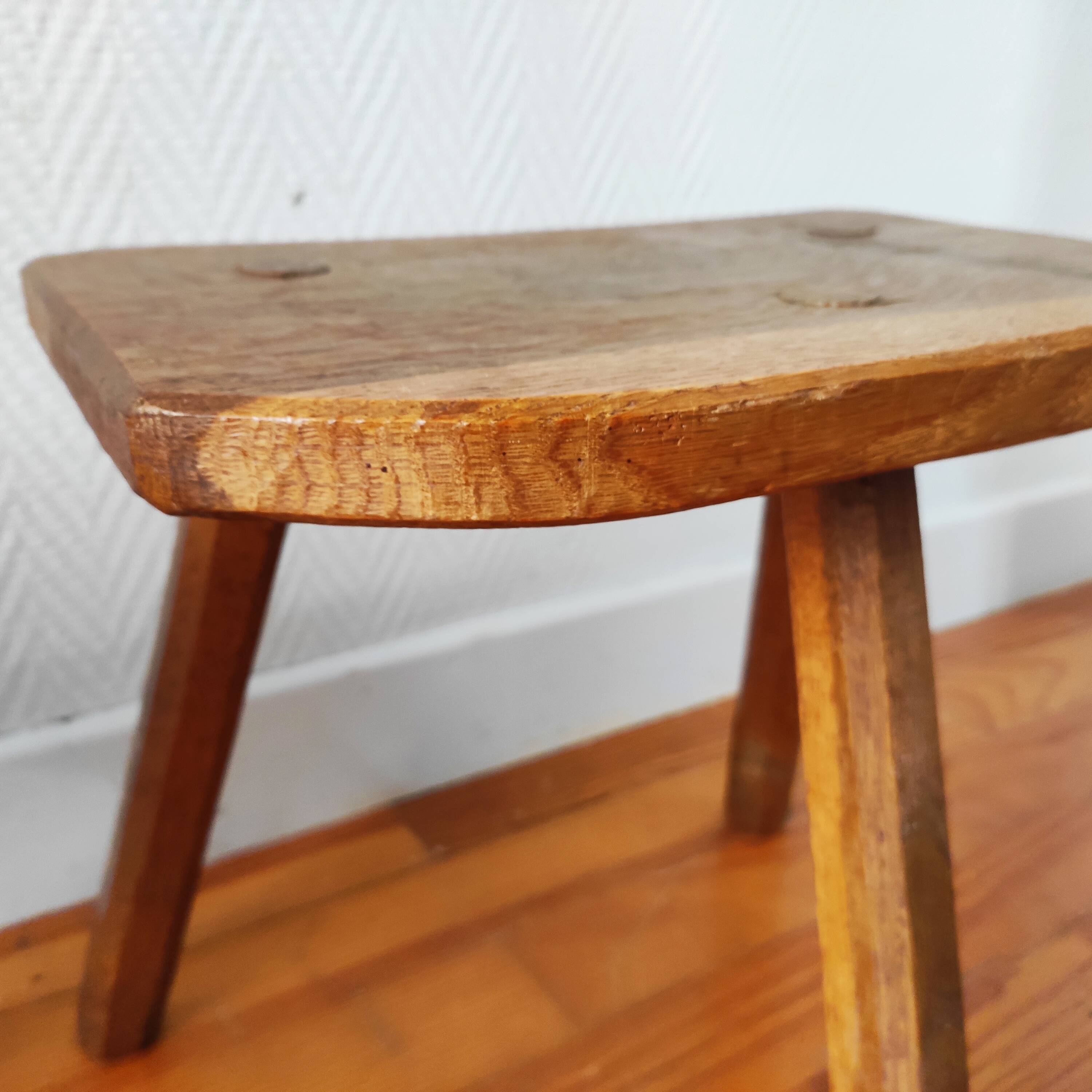 Pair of brutalist tripod stools in solid wood.