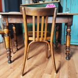 Antique farmhouse table and bistro chairs