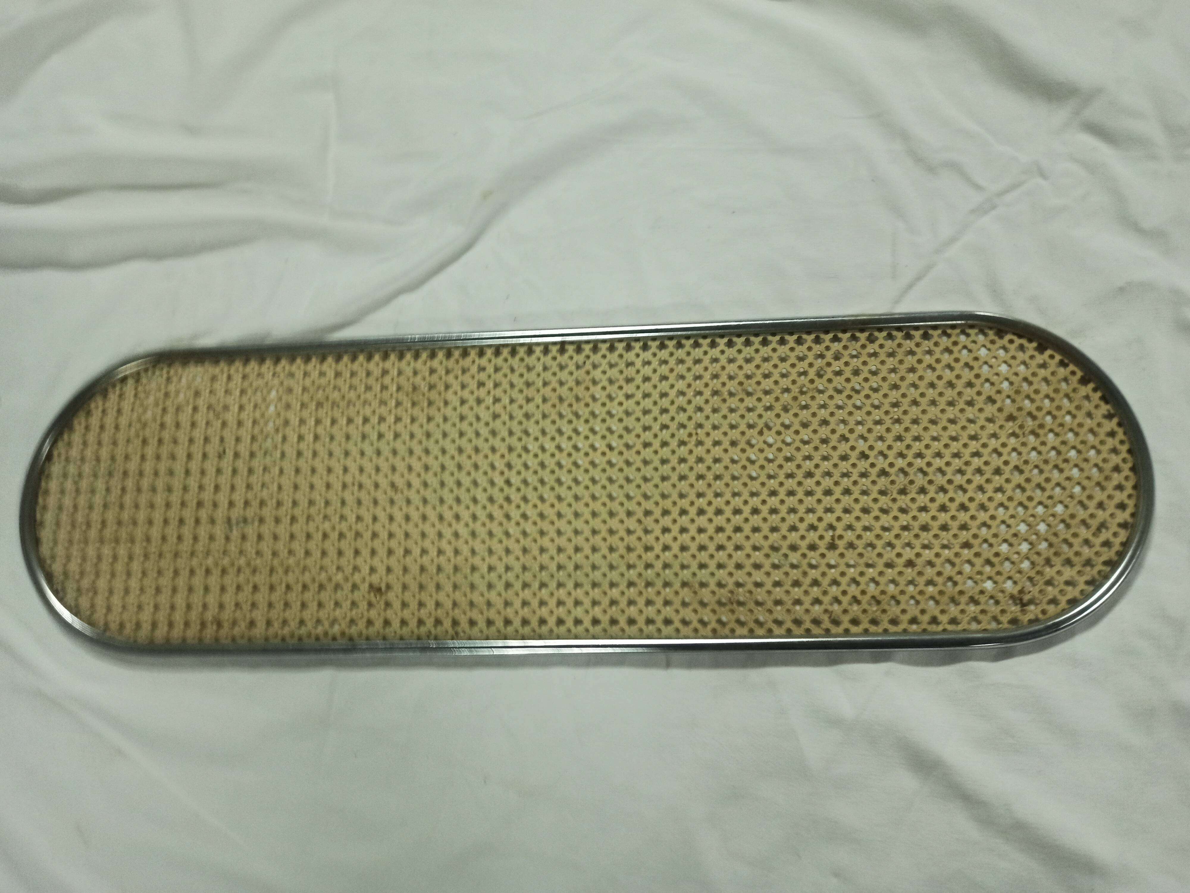Yellow perforated iron plate top