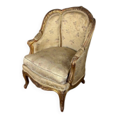 A Louis XV style child's bergère chair in carved and gilded wood, circa 1880