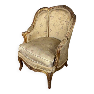 A Louis XV style child's bergère chair in carved and gilded wood, circa 1880
