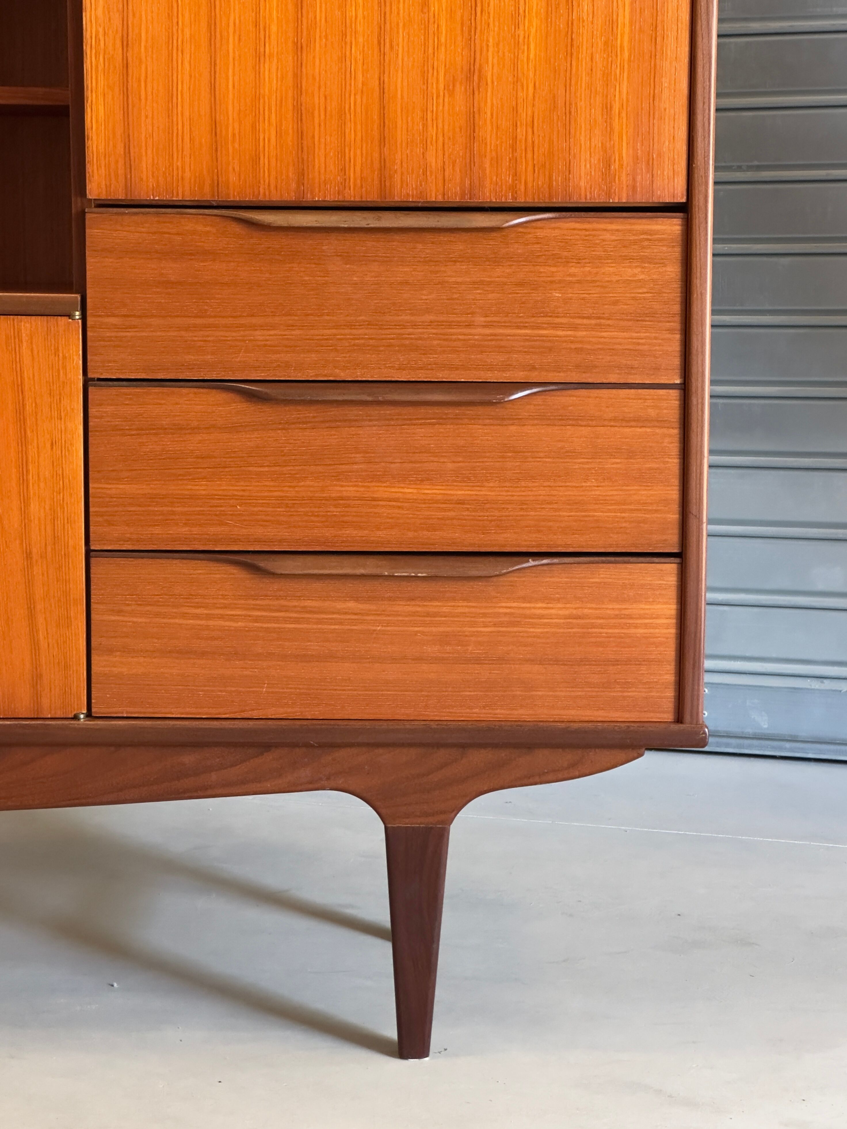 Very beautiful Scandinavian highboard in teak from the 1960s.