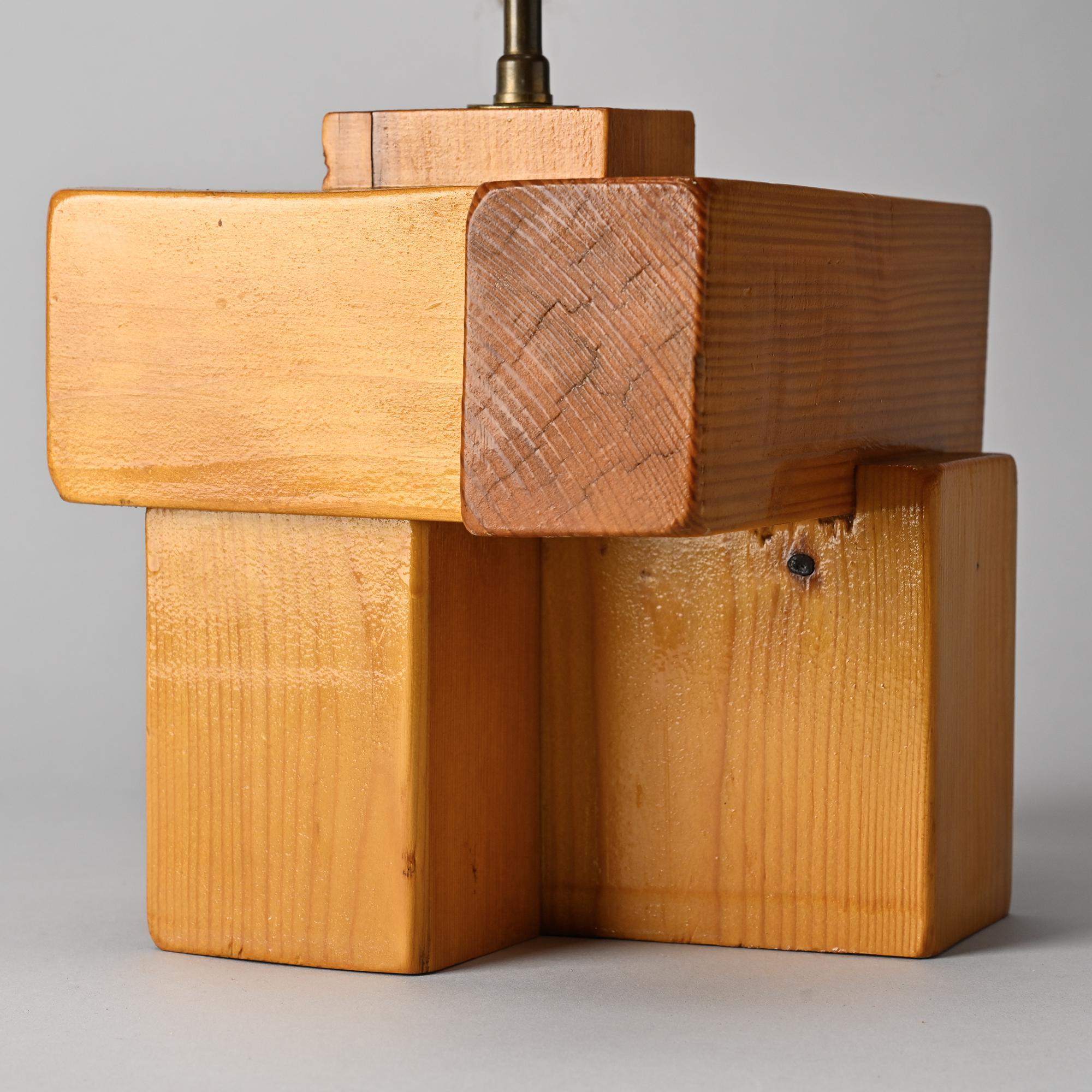 Sculptural table lamp in solid pine, France, circa 1970.