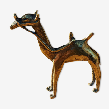 Dromedary standing in gilded brass