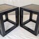 Chinese side tables in black lacquer, stone top.