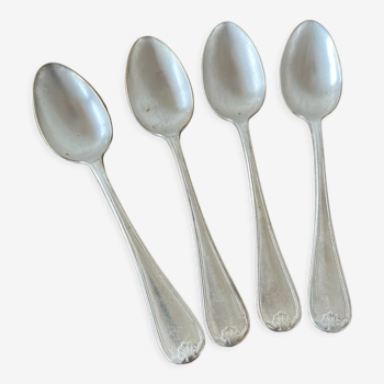 4 teaspoons in silver metal