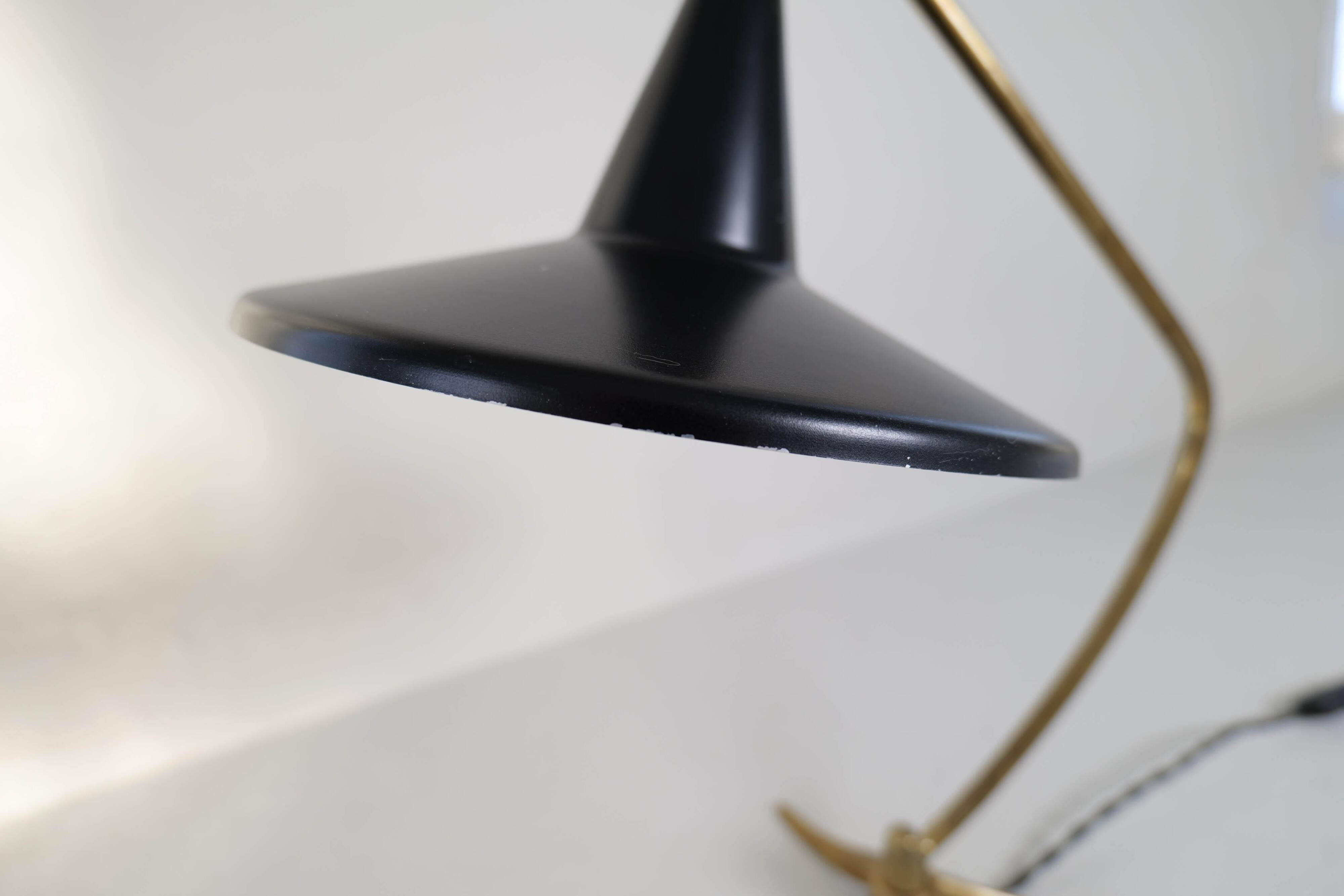 Brass table lamp on a tripod in modern Swedish style, Sweden, 1950.