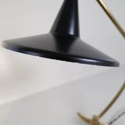 Brass table lamp on a tripod in modern Swedish style, Sweden, 1950.