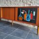 Vintage row with sliding doors and ceramic decoration
