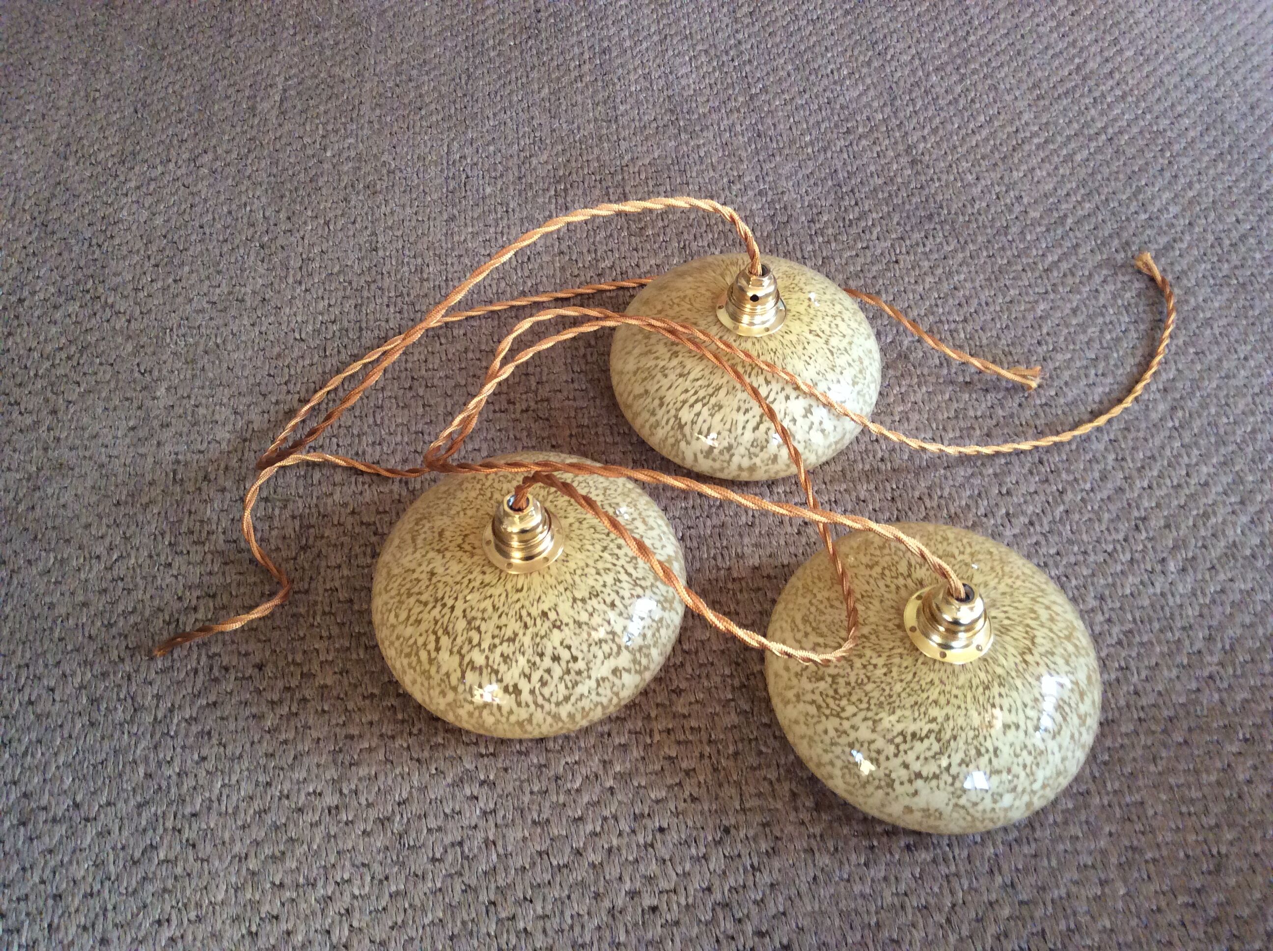 Trio of vintage suspensions