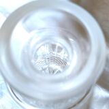 Small round carafe in highly worked cut crystal with stopper