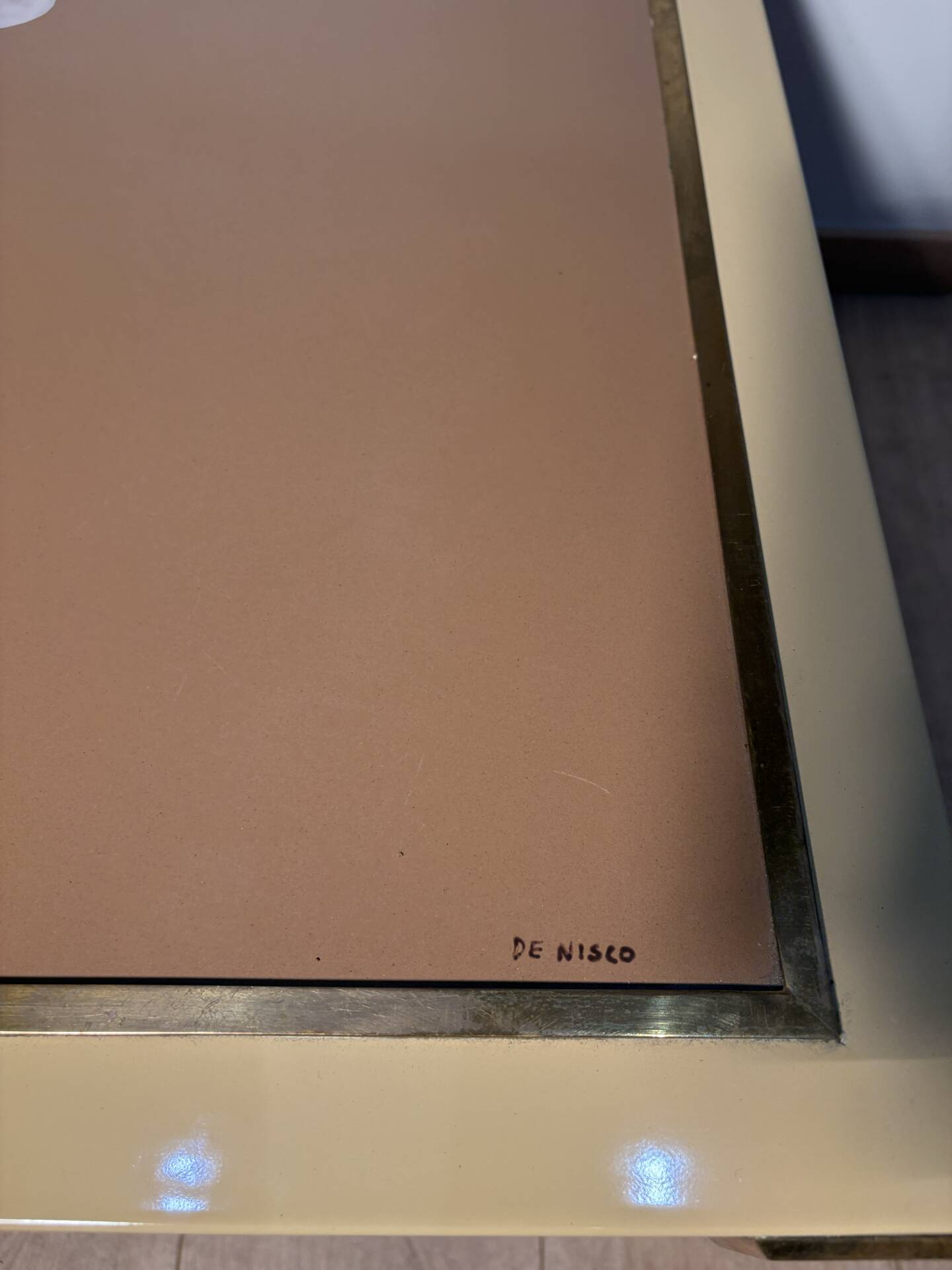 Metal and brass coffee table in ceramic by Nisco.