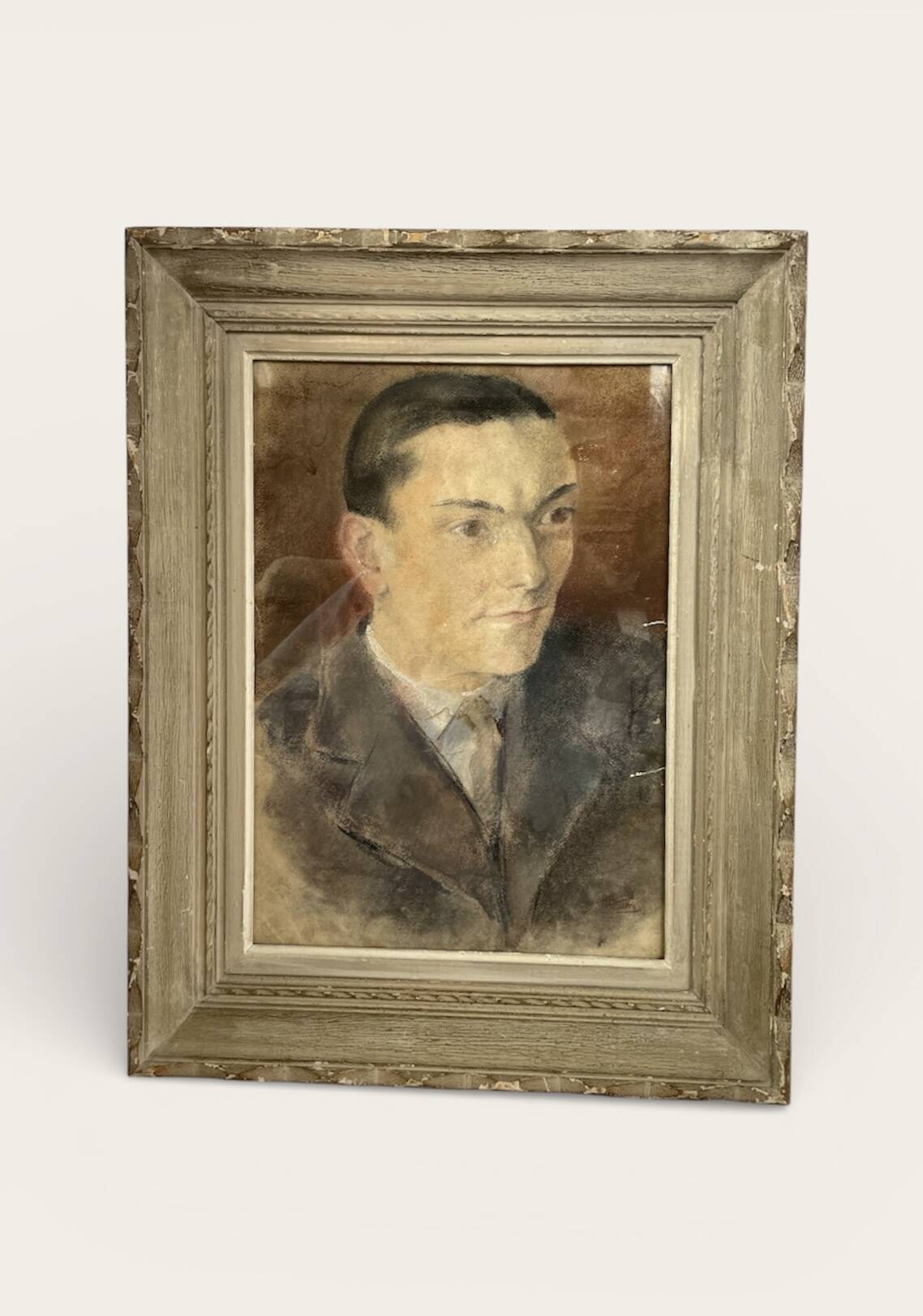 Portrait of a man in pastel under glass, signed, early 20th century.