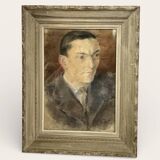 Portrait of a man in pastel under glass, signed, early 20th century.