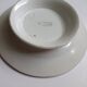 Old round footed plate signed Labrut brothers flowers