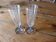 Lot de 2 flutes à Champagne en cristal gravés monogramme