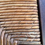 Vintage armchair in straw and brutalist wood