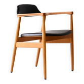Scandinavian armchair covered in imitation leather